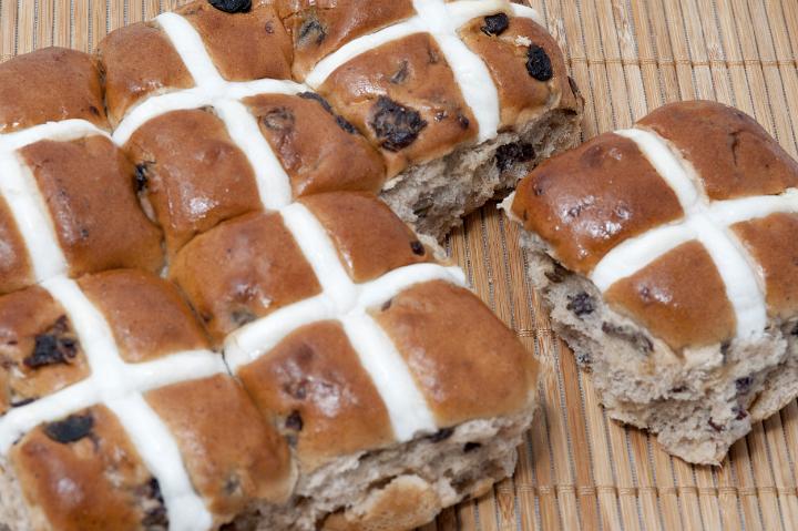 fresh_hotcross_buns.jpg - A freshly baked batch of Hot Cross Buns from an overhead perspective showing the glazed symbolic Easter cross