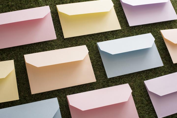 easter_messages.jpg - Rows of various colored blank envelopes for theme about the Easter holiday and greeting cards