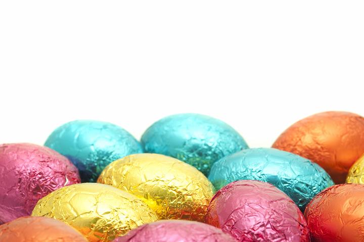 easter_egg_background.jpg - A flat arrangement of colourfully wrapped Easter Eggs with shall dof and copyspace