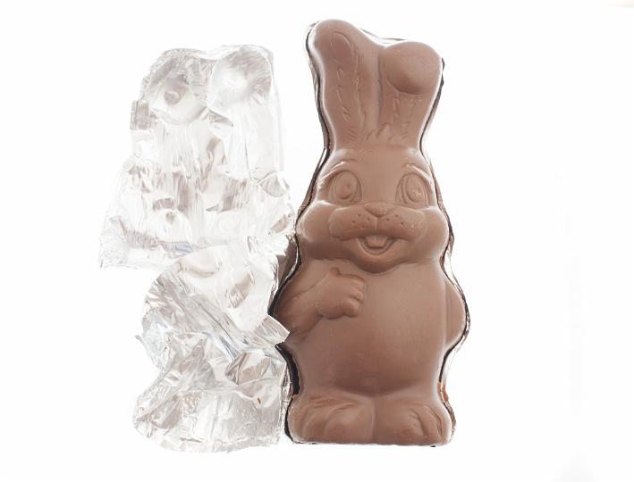 chocolate_bunny_rabbit.jpg - Easter Bunny chocolate candy out of foil wrapper, isolated on white background