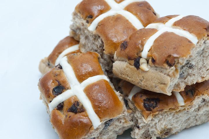 fruit_hotcross_buns.jpg - A batch of freshly baked fruity Hot Cross buns with lots of spices and raisins and white glazed crosses