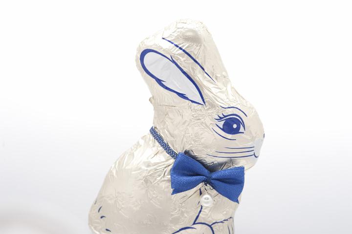chocolate_easter_rabbit.jpg - Chocolate Easter Rabbit still in its decorative foil wrapping with a blue bowtie